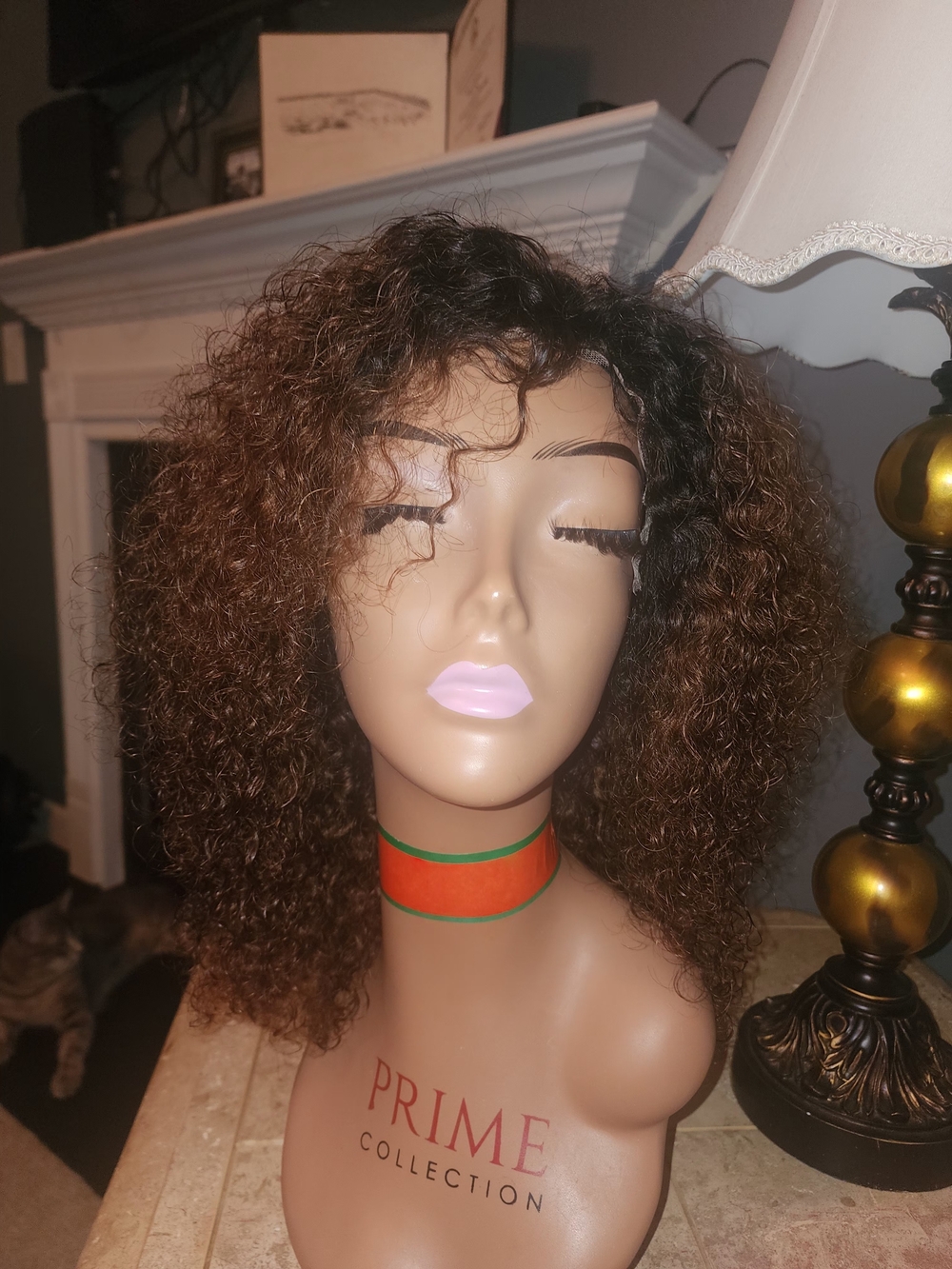 Pure Collection Afro Kinky Curly Human Hair Wig Brown with Auburn Highlights.